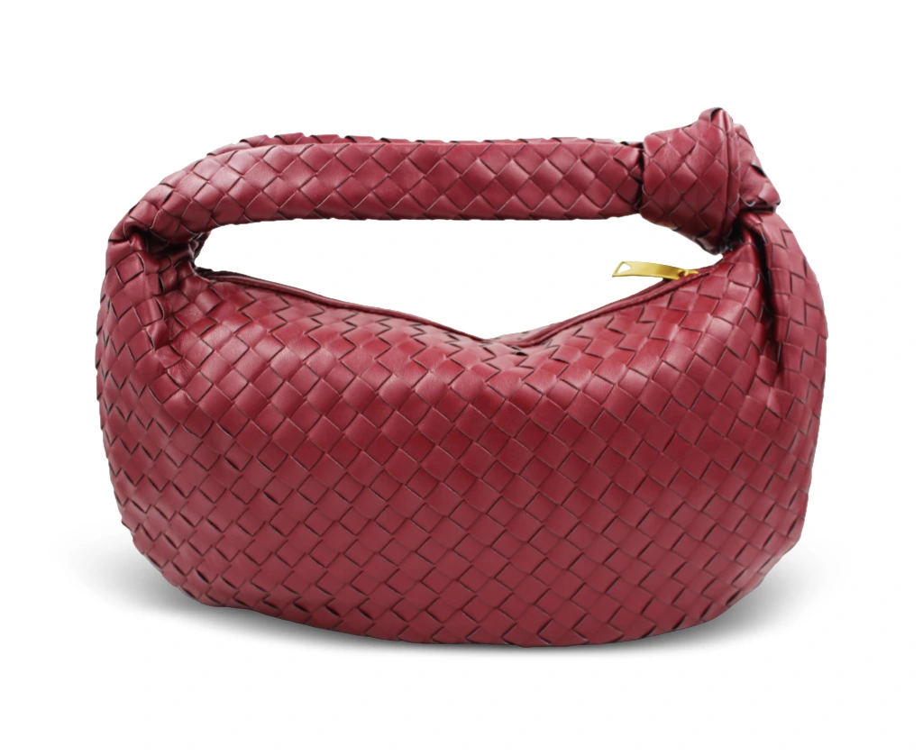 Shania large knot handle handbag in burgundy vegan leather with woven design, front view.